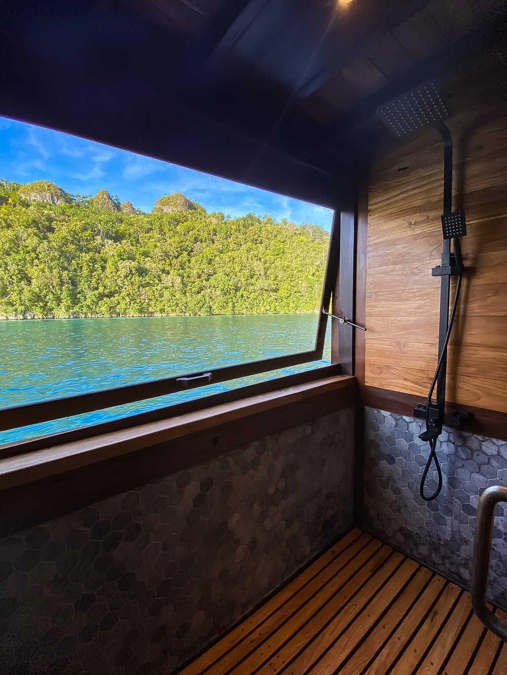 ph_senja_lowdef_master cabin_bathroom_shower_portrait 1.jpeg