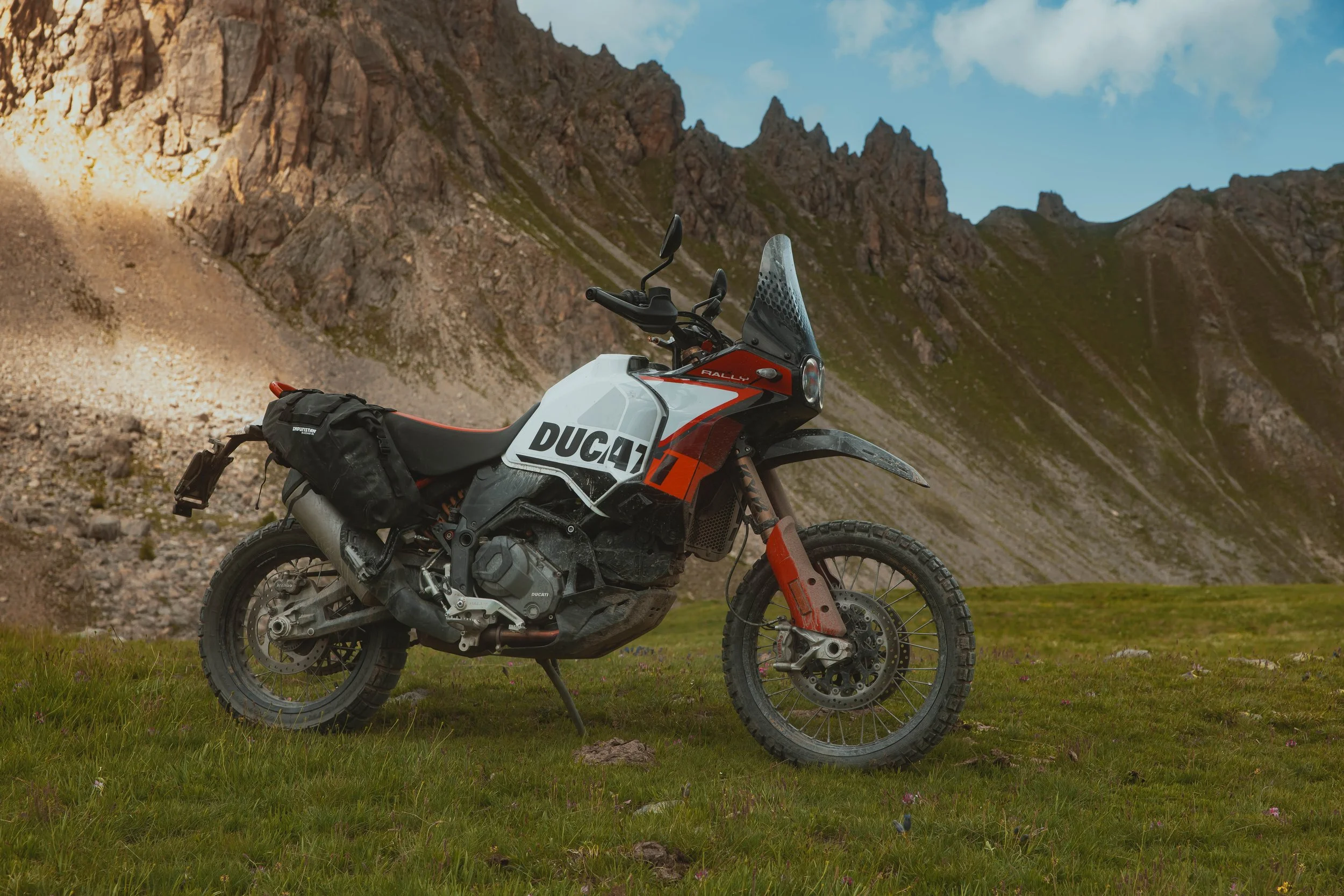 Enduristan adventure motorcycle luggage tested on Ducati Desert X Rally in the Italian Western Alps