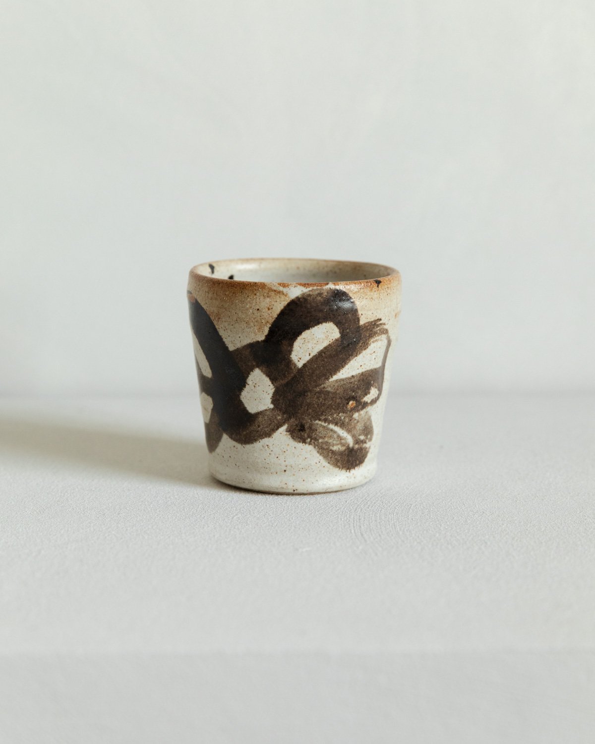 Beaker – Dolomite / Black Glaze by Nicola Gillis