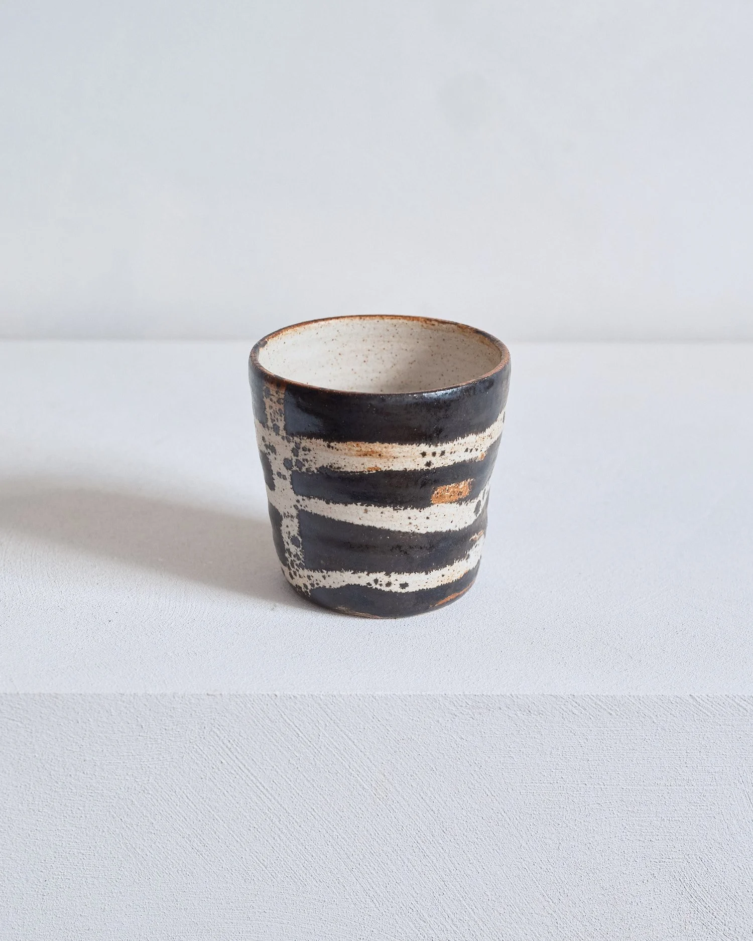 Beaker – Dolomite / Black Glaze by Nicola Gillis
