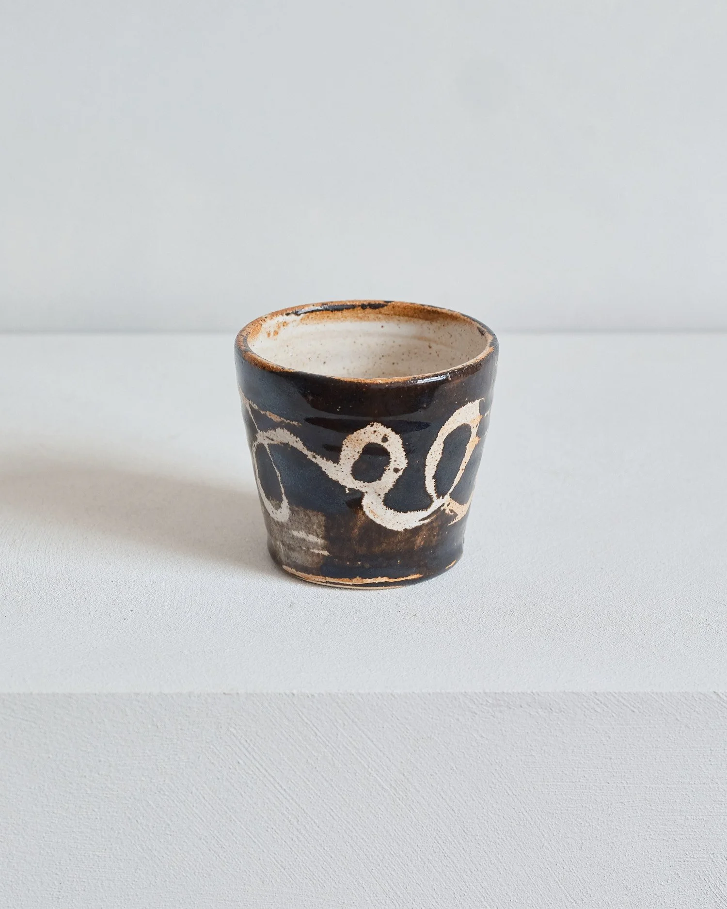 Beaker – Dolomite / Black Glaze by Nicola Gillis