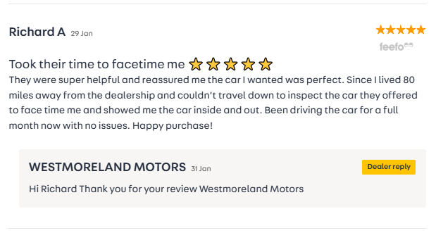 A customer review on Westmoreland Motors' website. The review is by Richard A, dated January 29, and rates the dealership five stars. Richard praises their helpfulness, particularly mentioning a video call to inspect a car remotely due to living 80 miles away. A reply from Westmoreland Motors on January 31 thanks Richard for the review.