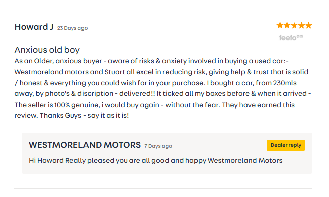 A customer review by Howard J praising Westmoreland Motors for reducing anxiety and providing trust in a used car purchase, mentioning a positive experience with delivery. The review is rated five stars. Westmoreland Motors replies expressing happiness with Howard's satisfaction.
