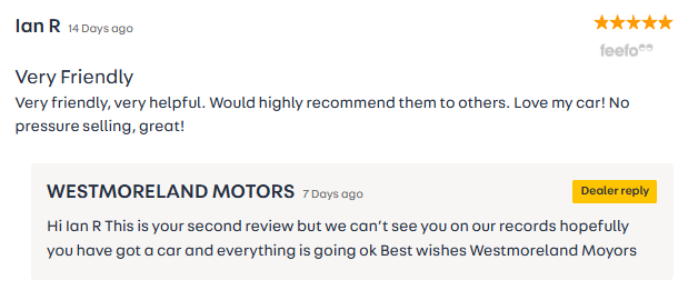 Screenshot of a review and a reply. The review by Ian R is titled "Very Friendly" and praises the service, recommending the dealership and mentioning satisfaction with a car purchase. It includes a five-star rating. The reply from Westmoreland Motors acknowledges the review but notes Ian R is not on their records, expressing hope that everything is fine with the car. The reply is labeled "Dealer reply."