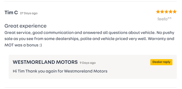 A customer review for Westmoreland Motors. The review is from Tim C, 27 days ago, giving a five-star rating. Tim praises the great service, good communication, and non-pushy sales approach, mentioning the vehicle was well-priced and that warranty and MOT were a bonus. Westmoreland Motors replied 9 days ago, thanking Tim.