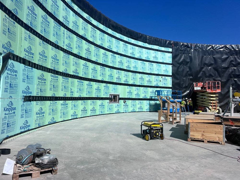 Curved building wall under construction