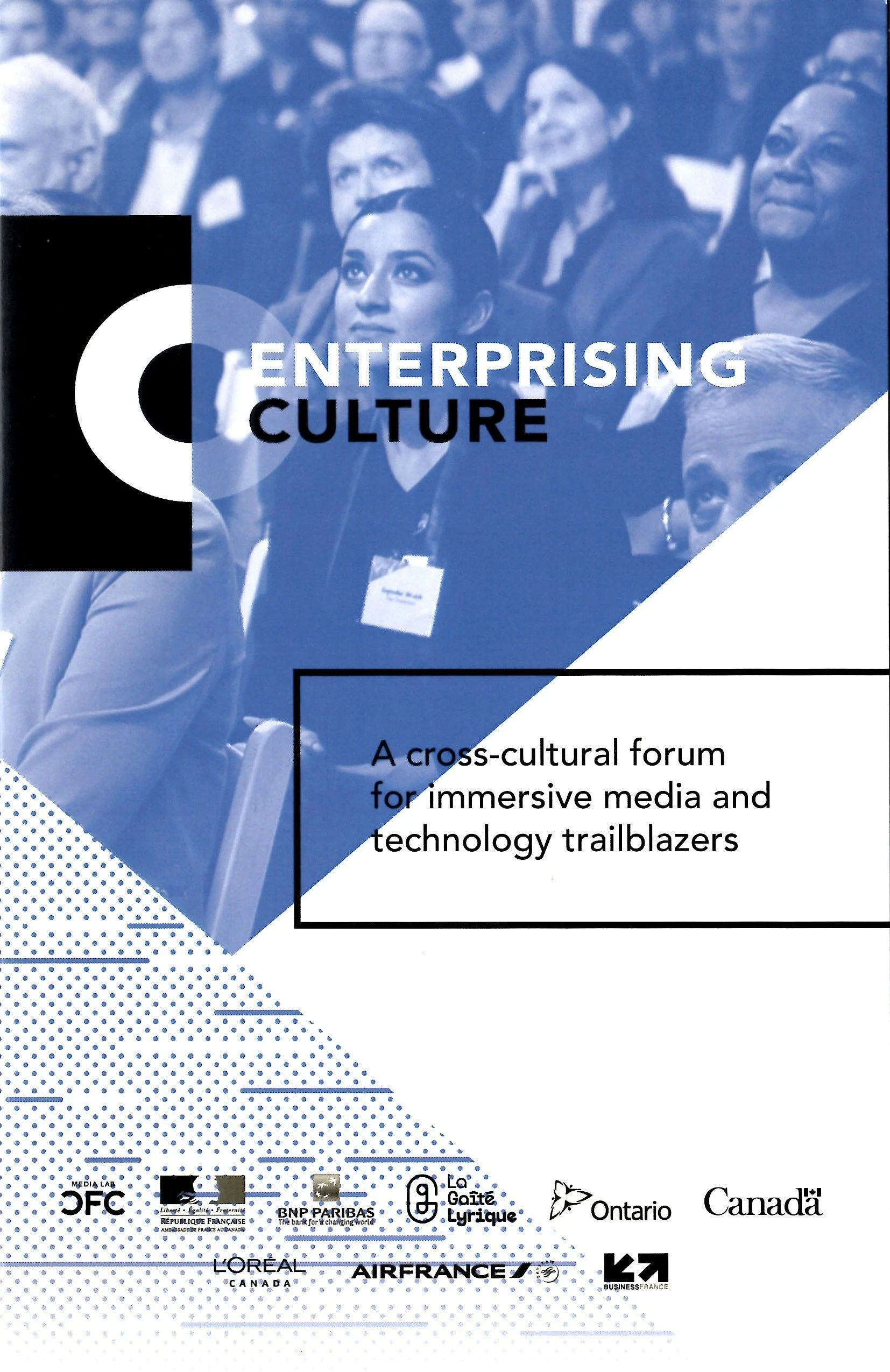 Cover of a publication titled 'Enterprising Culture' showing a group of diverse people attending a conference, with a subtitle describing it as a cross-cultural forum for immersive media and technology trailblazers.