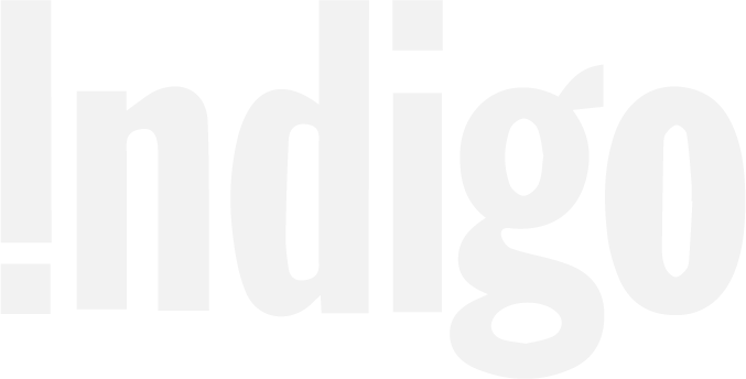 Close-up of white text on a black background spelling 'indigo'.