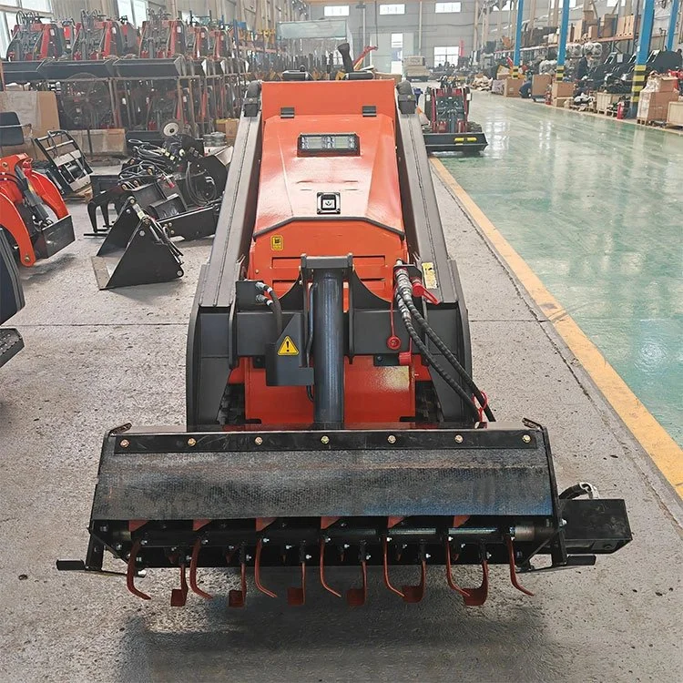 Industrial warehouse with farming equipment, including a flail mower