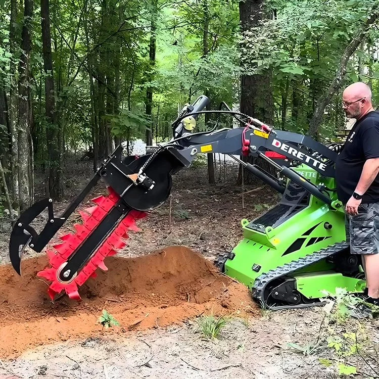 Man operating a mini excavator with trencher attachment in forest.