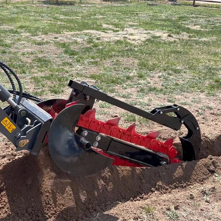 Trencher machine digging soil in a field