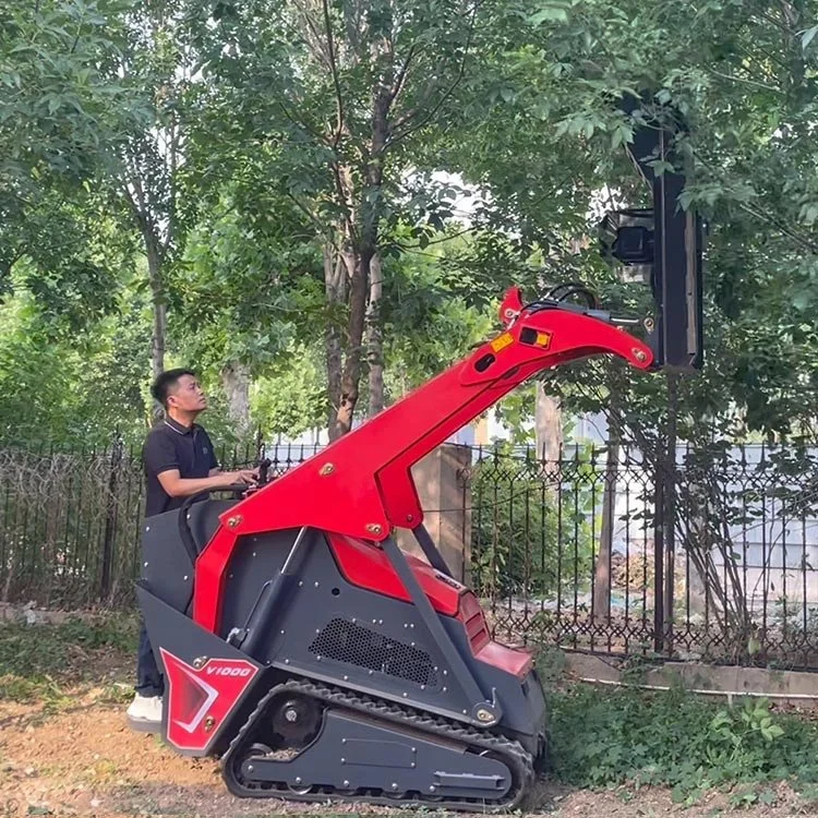 Person operating a red mini excavator with a tree grab attachment.