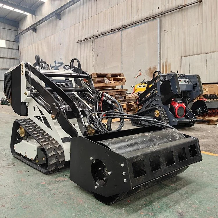 Industrial warehouse scene with two skid steer loaders equipped with attachments, wooden pallets, and tools.