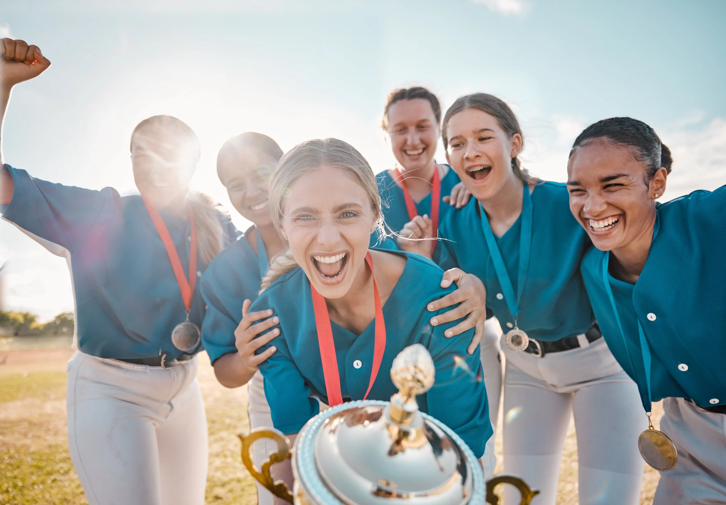 winning-trophy-and-team-of-women-in-baseball-portr-2023-11-27-04-55-38-utc.jpg