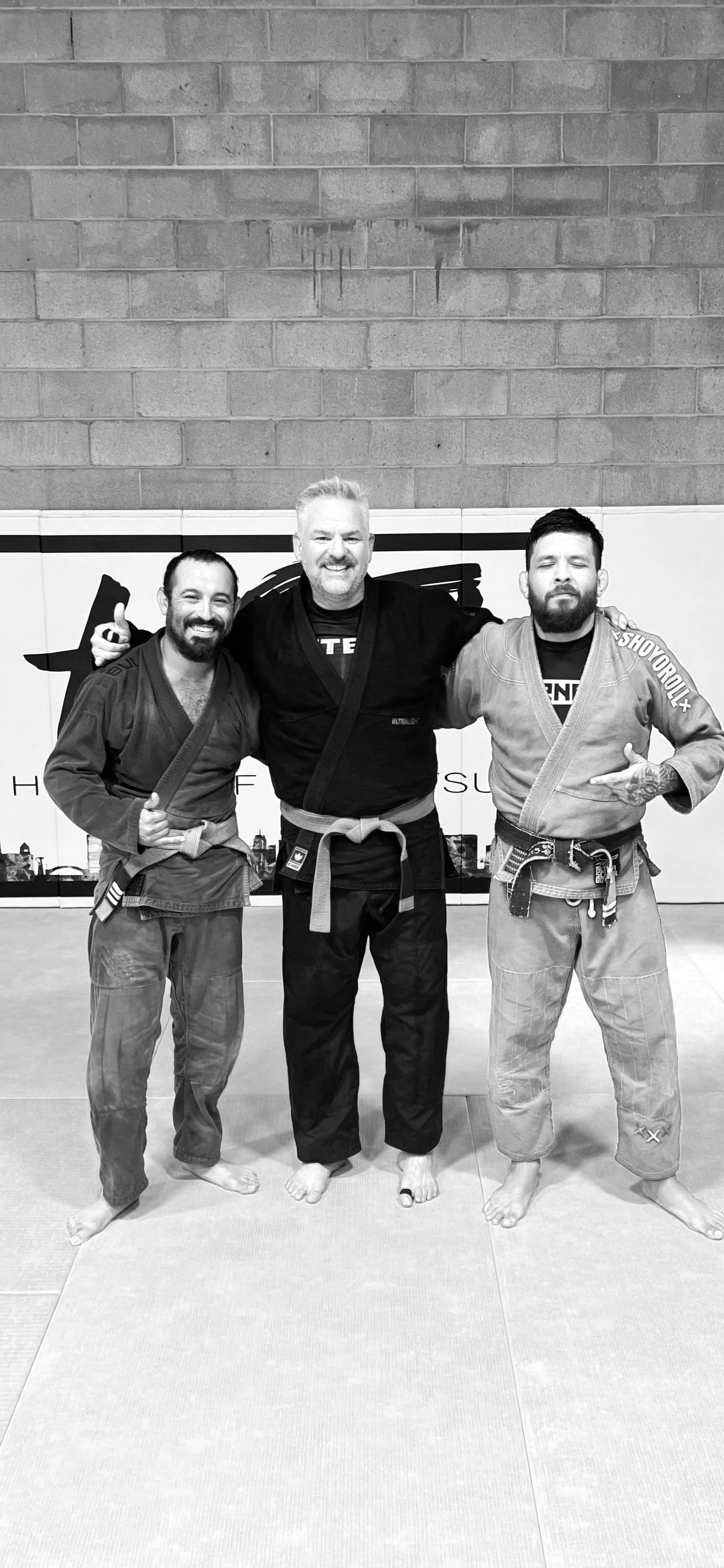 Jiu Jitsu gym members from Palisade, Fruita, Clifton, and Grand Junction supporting each other on the mats