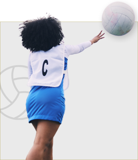 A person with curly hair wearing a volleyball uniform and jersey with the letter 'C', reaching out to hit a volleyball.