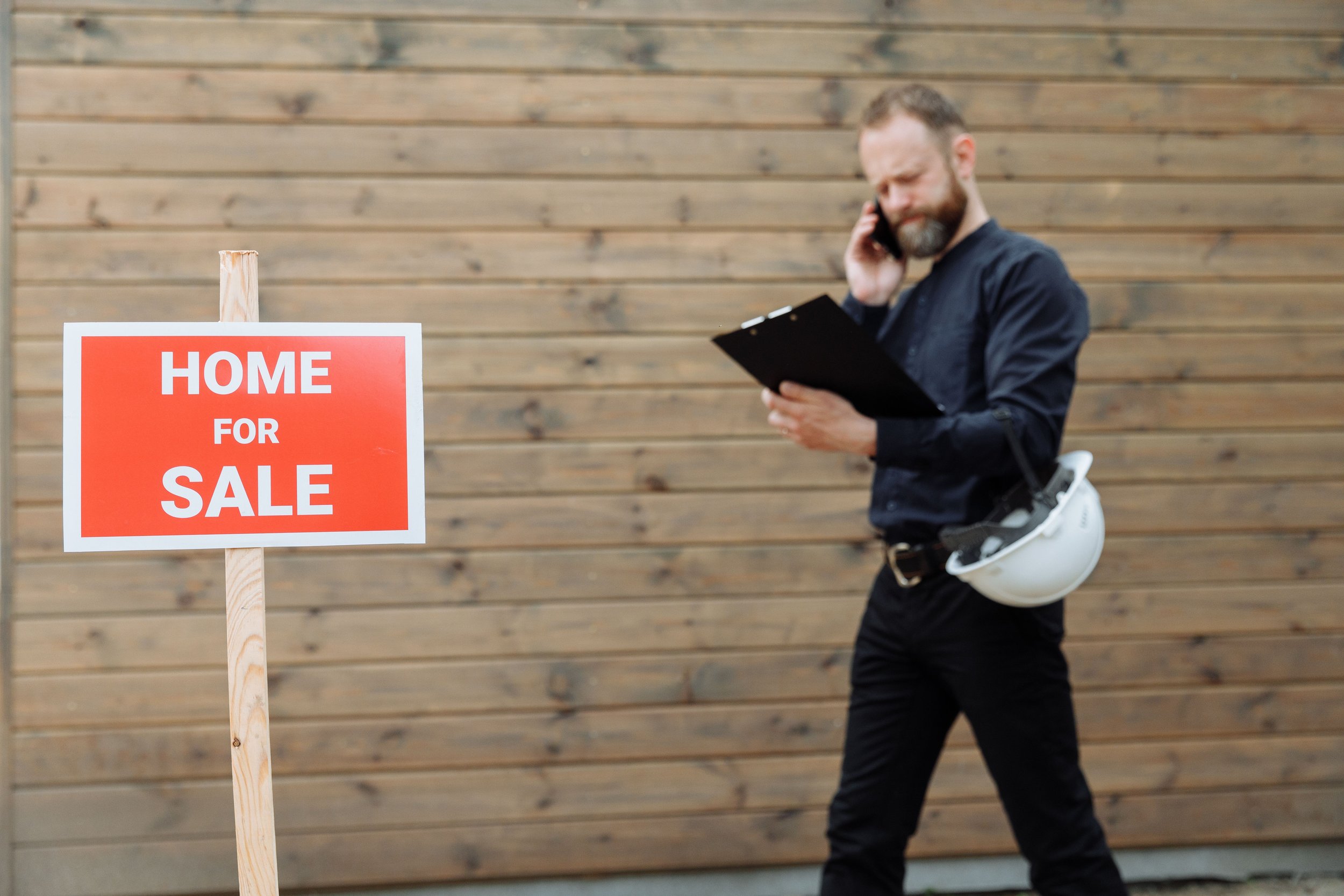 Real estate agent reviewing a home for sale in Mansfield Texas after the housing market shifted