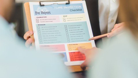 Home inspection checklist held during buyer due diligence for a residential property.