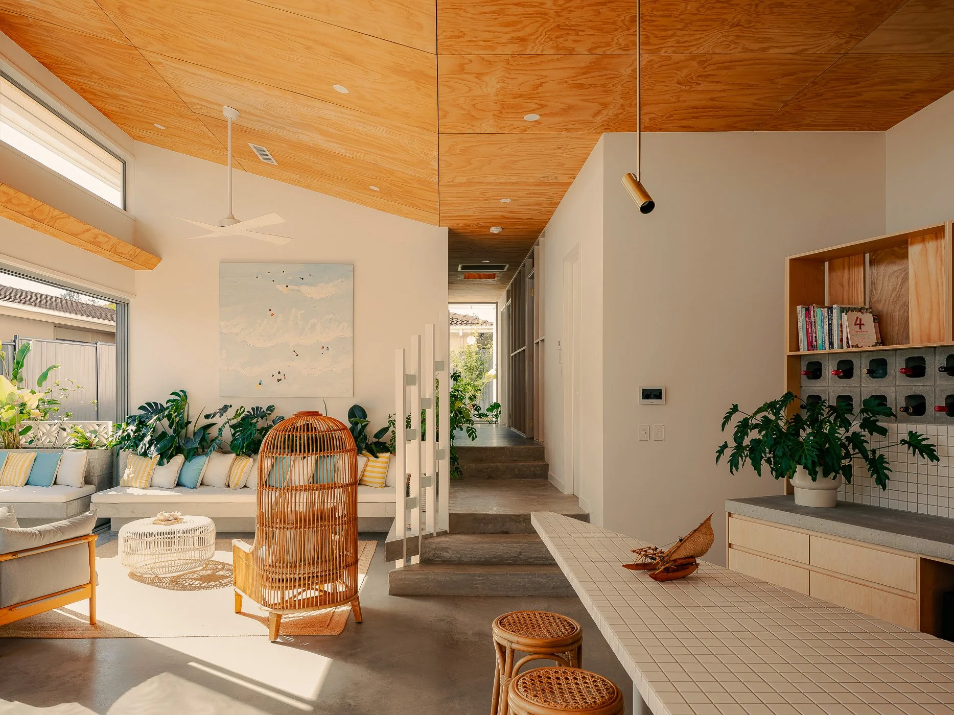 Goldie Homes architectural family home in Southeast Queensland with tropical landscaping and screened facade