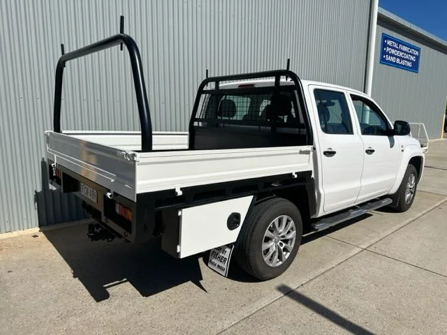 White ute with a flatbed and black safety rails, custom ute tray and powder coating Wagga Wagga. Sandblasting and powder coating service Wagga with custom truck and ute bodies and ute trays. 