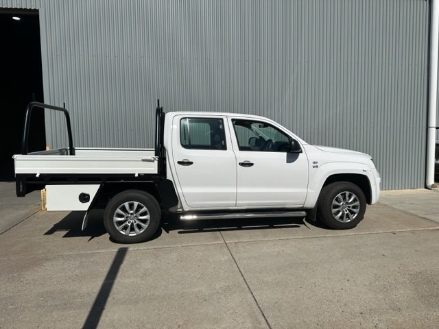 White ute with a flatbed, custom ute tray and powder coating Wagga Wagga. Sandblasting and powder coating service Wagga with custom truck and ute bodies and ute trays. 