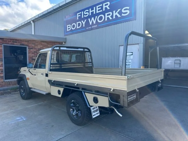White ute with flatbed, custom ute tray and powder coating Wagga Wagga. Sandblasting and powder coating service Wagga with custom truck and ute bodies and ute trays. 