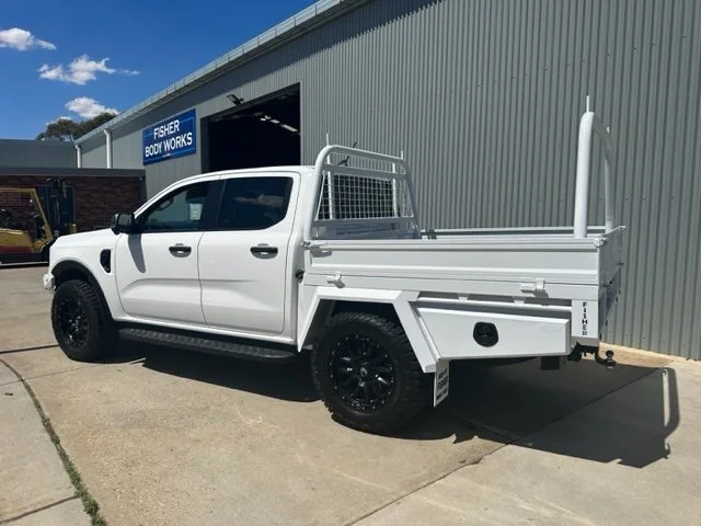 White ute with black wheels, custom ute tray and powder coating Wagga Wagga. Sandblasting and powder coating service Wagga with custom truck and ute bodies and ute trays. 