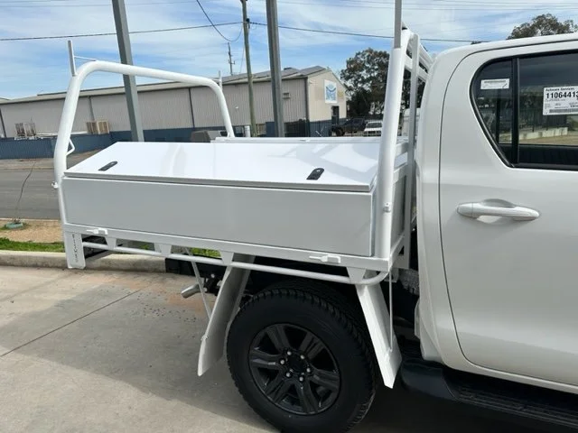 White utility ute with a flatbed, custom ute tray and powder coating Wagga Wagga. Sandblasting and powder coating service Wagga with custom truck and ute bodies and ute trays. 