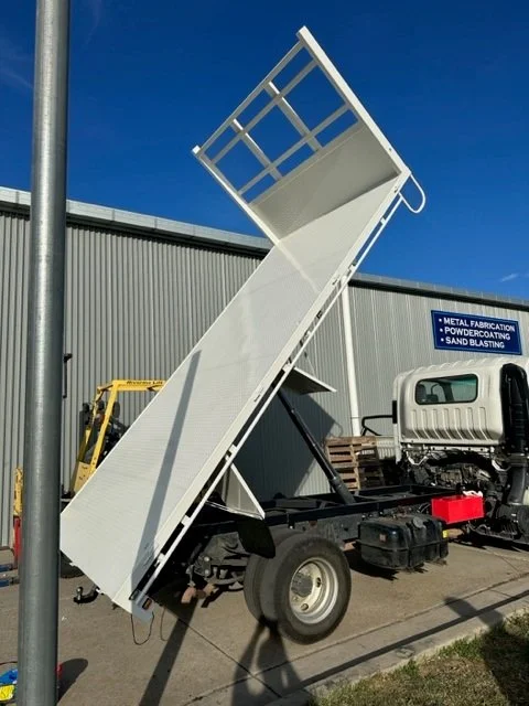 Flatbed truck with tipper bed, custom ute tray and powder coating Wagga Wagga. Sandblasting and powder coating service Wagga with custom truck and ute bodies and ute trays. 