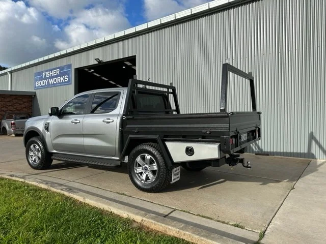 Silver ute with a black flatbed, custom ute tray and powder coating Wagga Wagga. Sandblasting and powder coating service Wagga with custom truck and ute bodies and ute trays. 