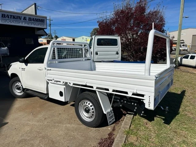 White flatbed ute, custom ute tray and powder coating Wagga Wagga. Sandblasting and powder coating service Wagga with custom truck and ute bodies and ute trays. 