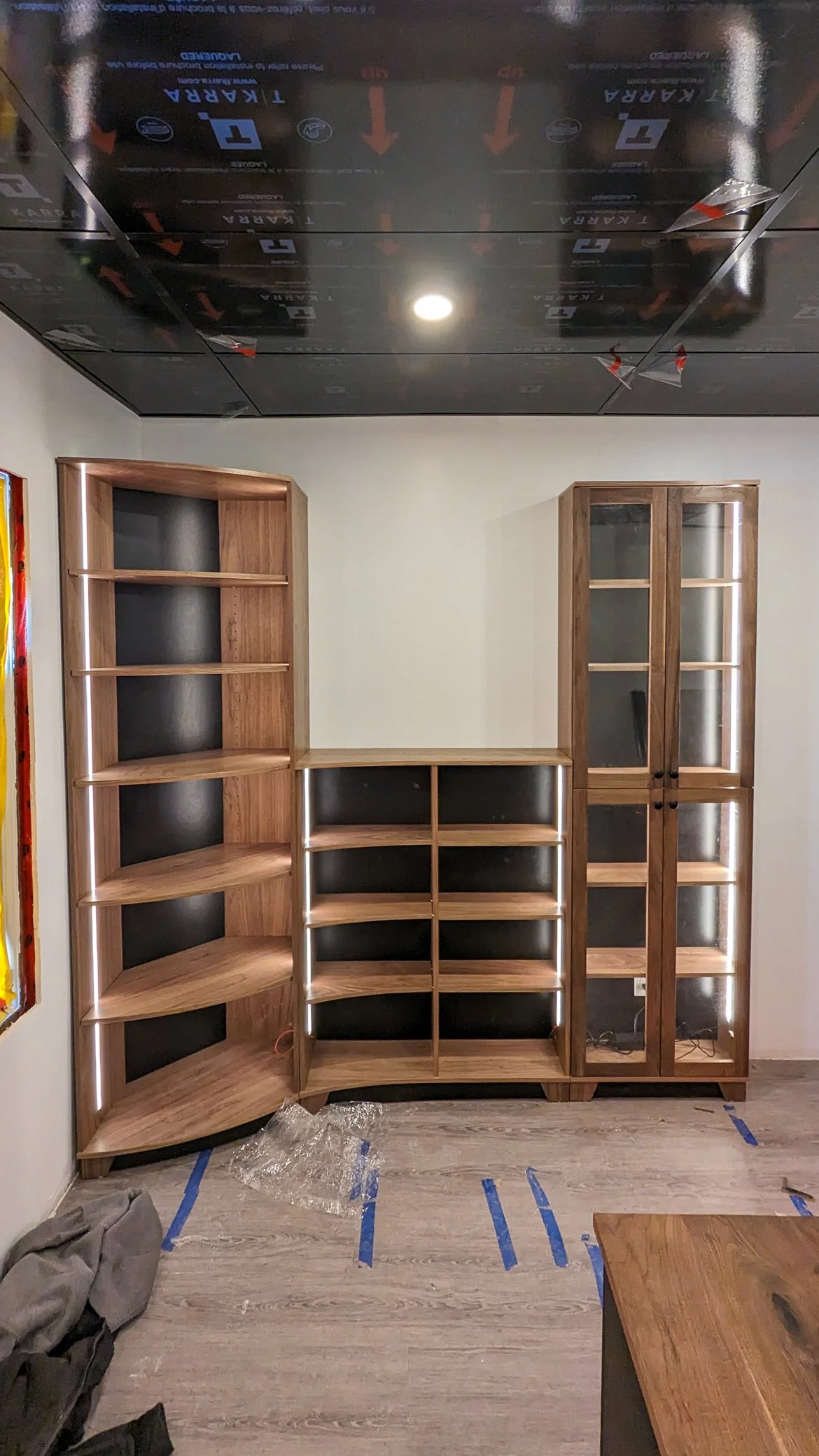 Custom bookcase with rounded shelves and integrated LED lights