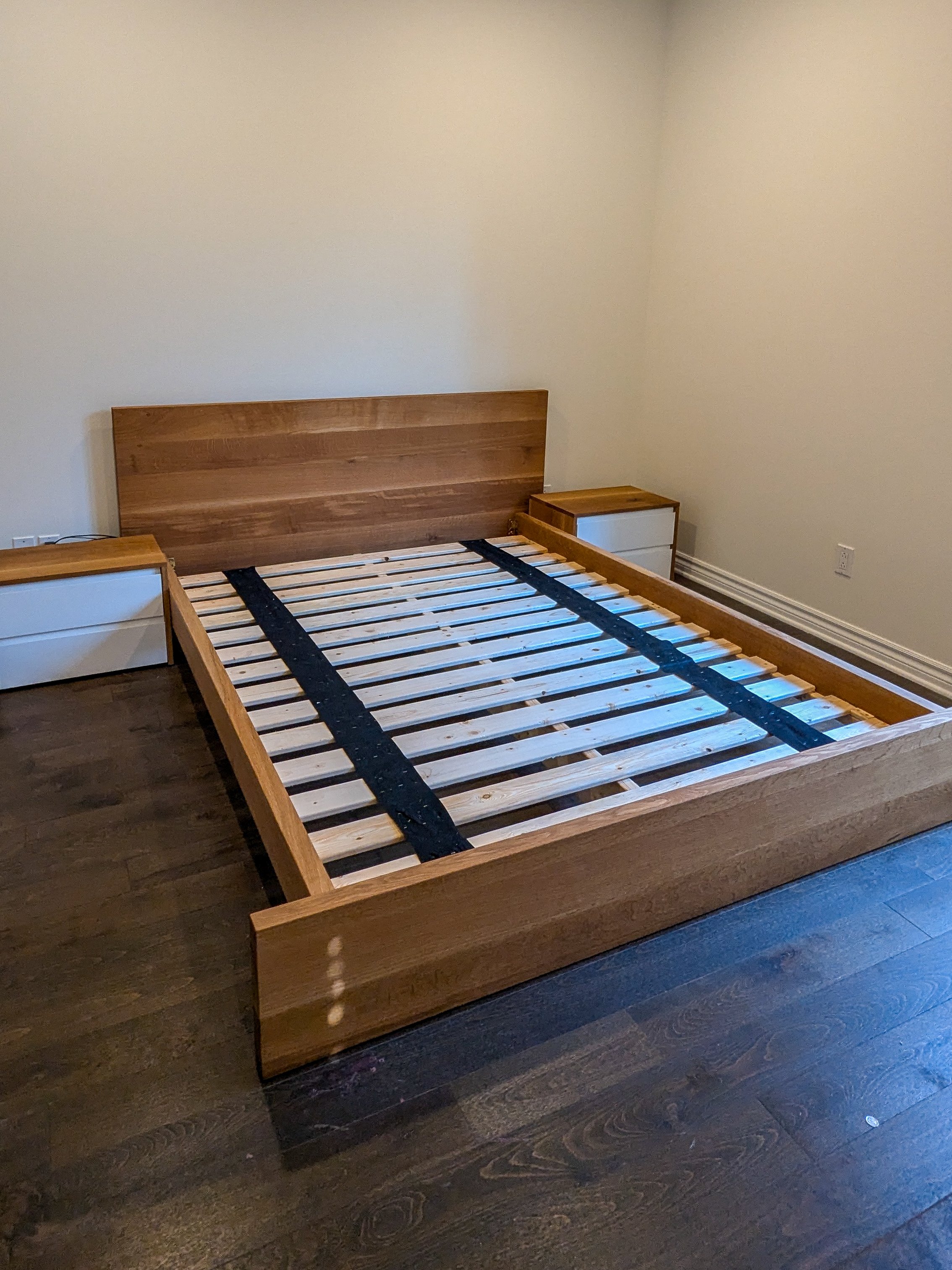 An image of The custom bedframe and nightstands