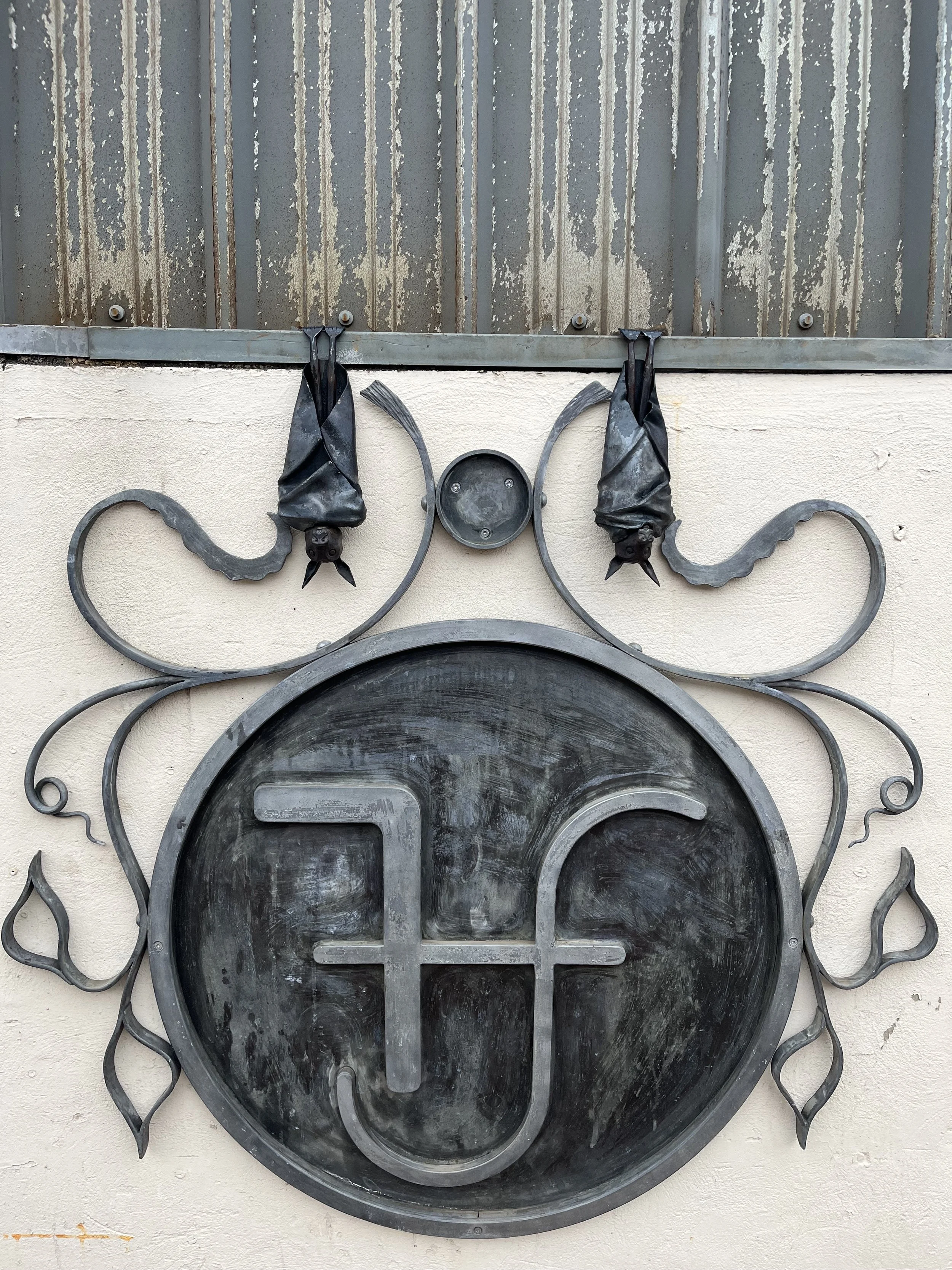 Hanging Bat Sculptures and Finkle Forge sign