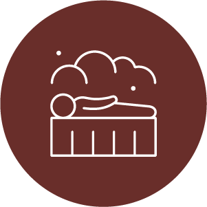 Line drawing of person lying in sauna in red circle