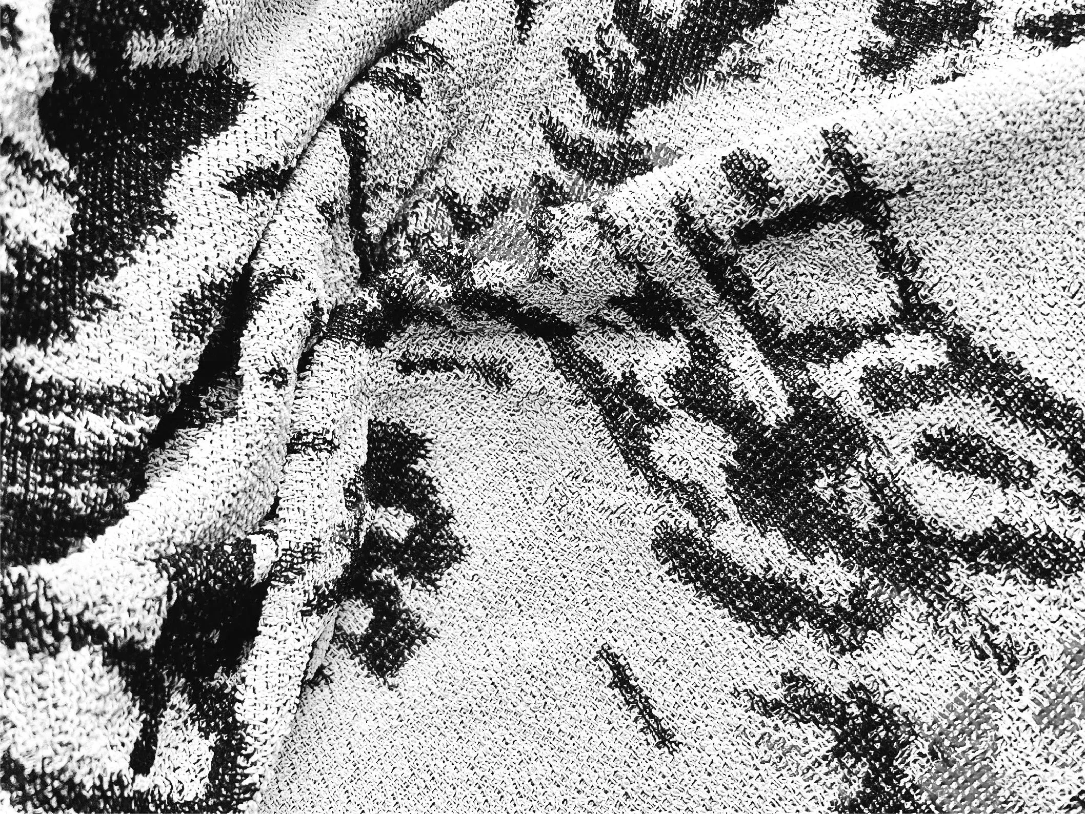 Close-up of a loop knit jacquard pattern from abstract handdrwan graphic.