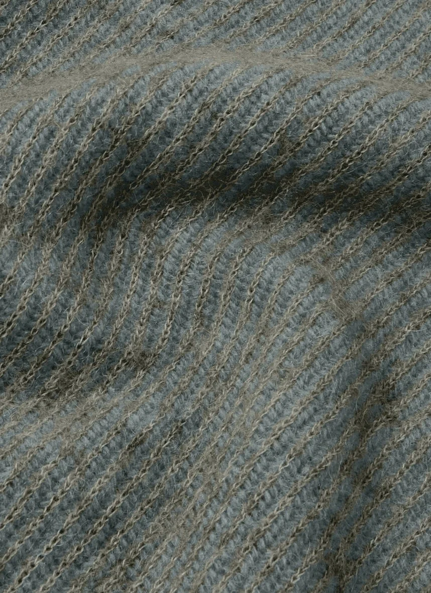 Close-up of a grey fabric with diagonal brown and beige striped pattern.