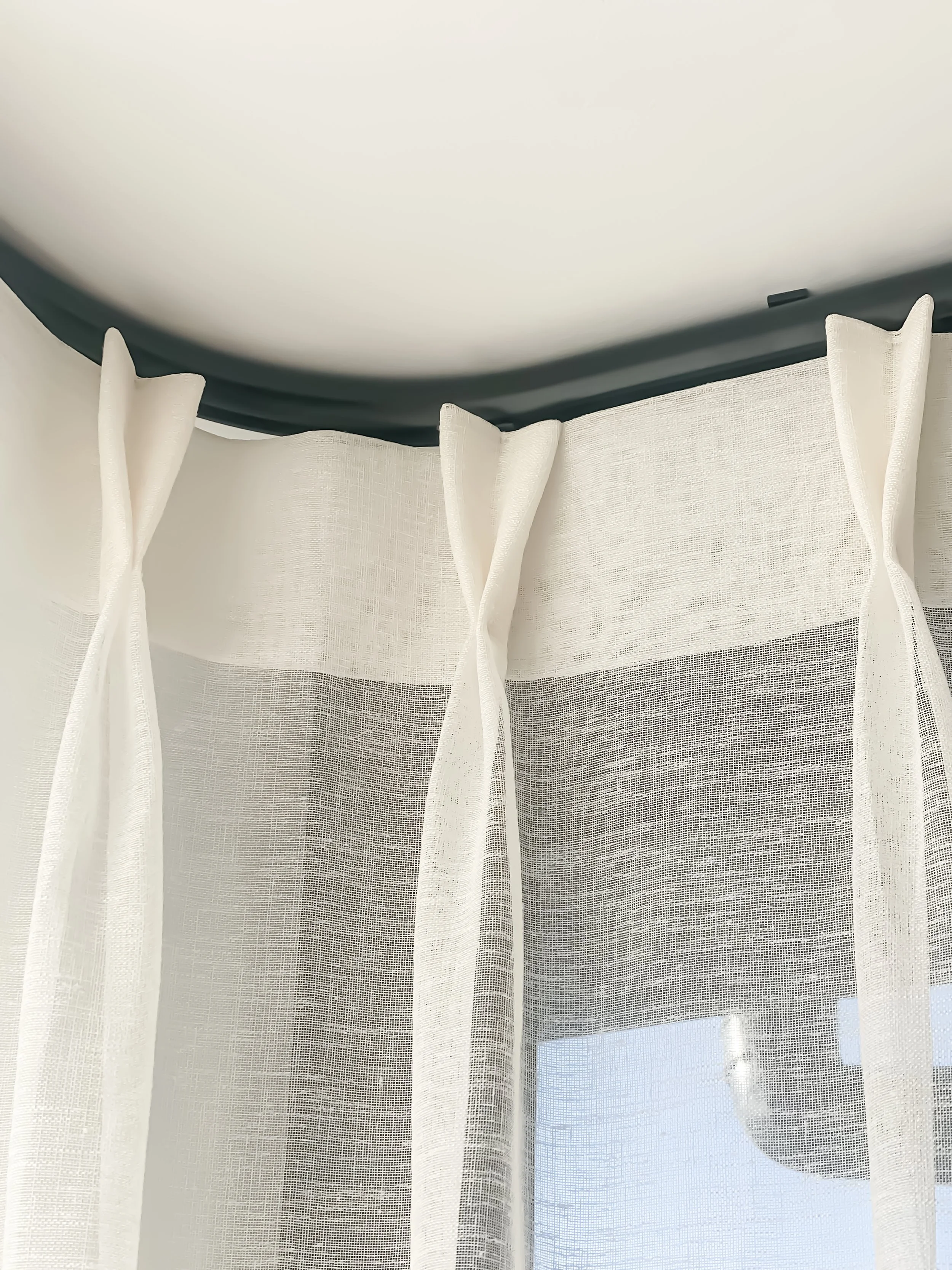 Tailored Pinch Pleat Voiles on bent track