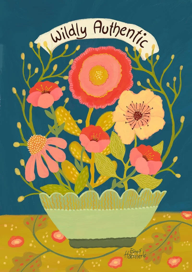 A cheerful illustrated art print featuring a bouquet of colourful wildflowers in a scalloped bowl, set against a deep teal background with the words "Wildly Authentic" on a ribbon banner.