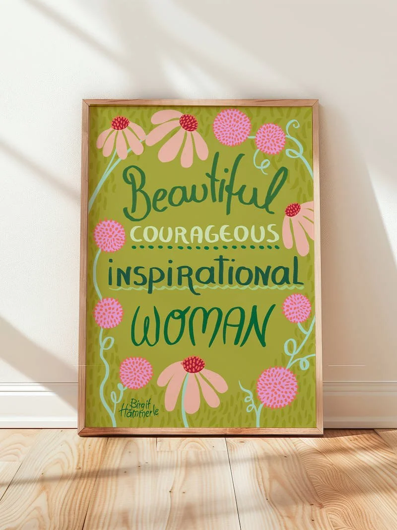 Inspirational woman art print with floral folk art design featuring hand lettering saying Beautiful Courageous Inspirational Woman surrounded by pink flowers on a green background.