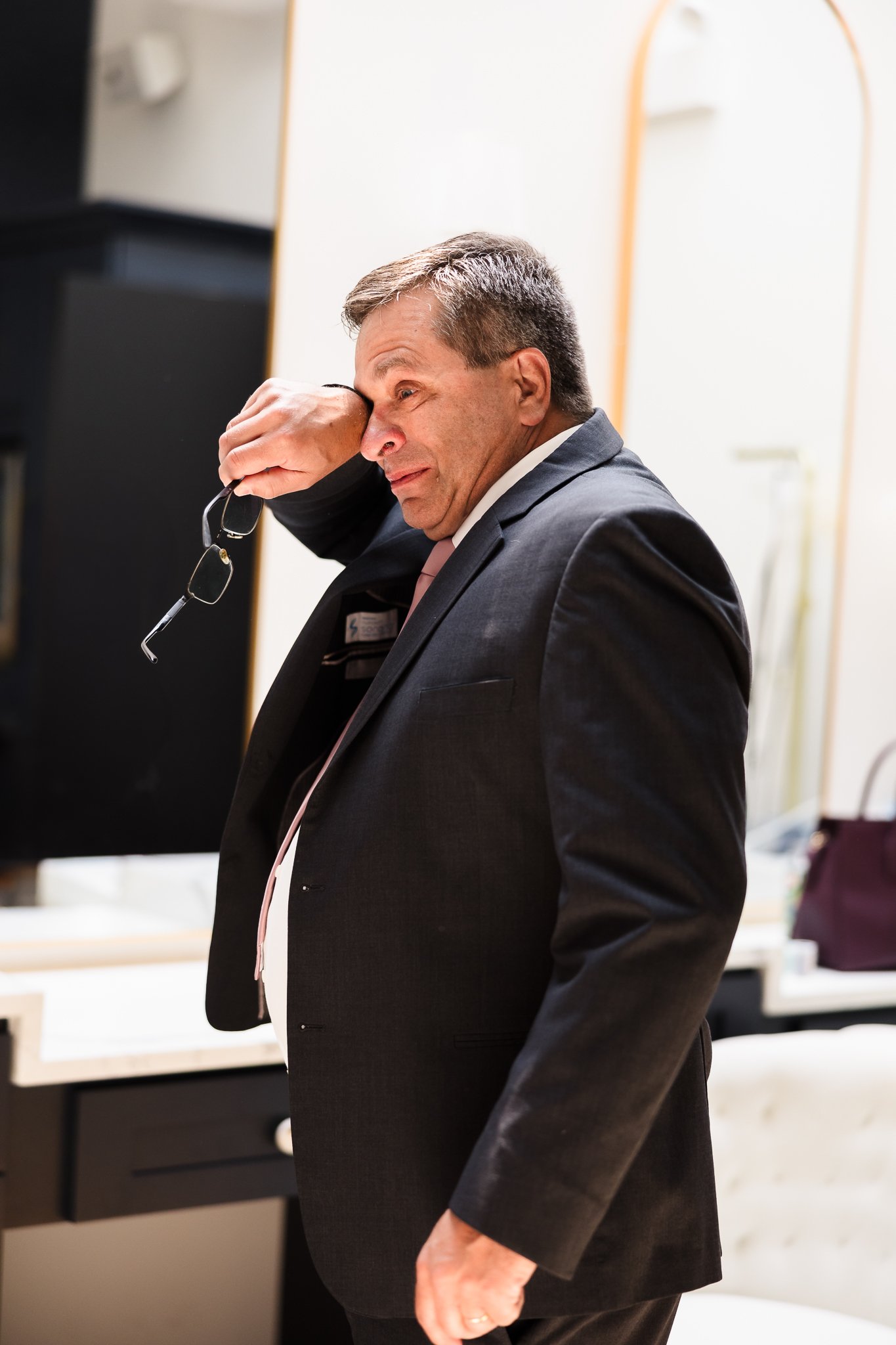 Father crying in first look with bride.jpg