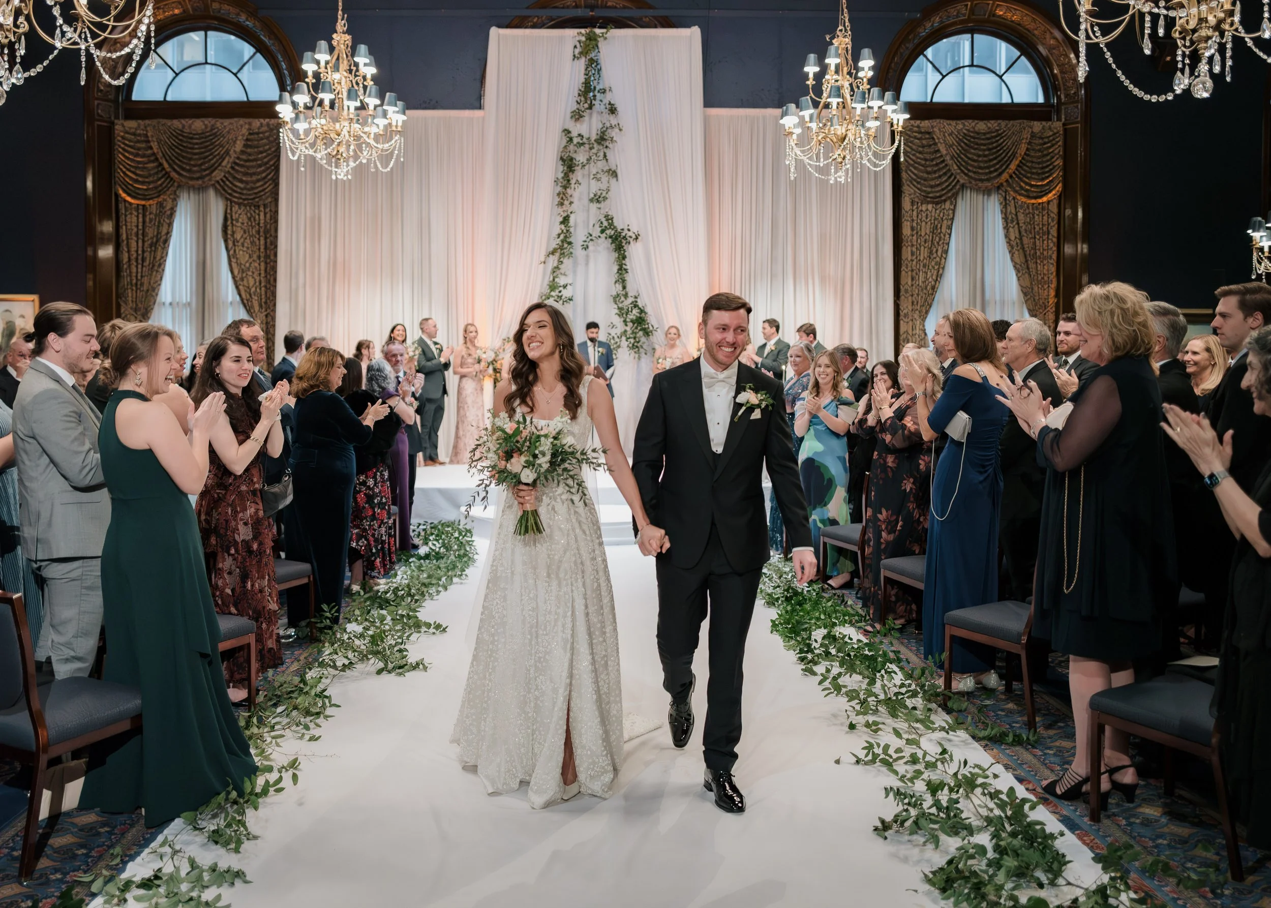 Bride and groom ceremony exit at Union League Club Chicago Wedding Venue