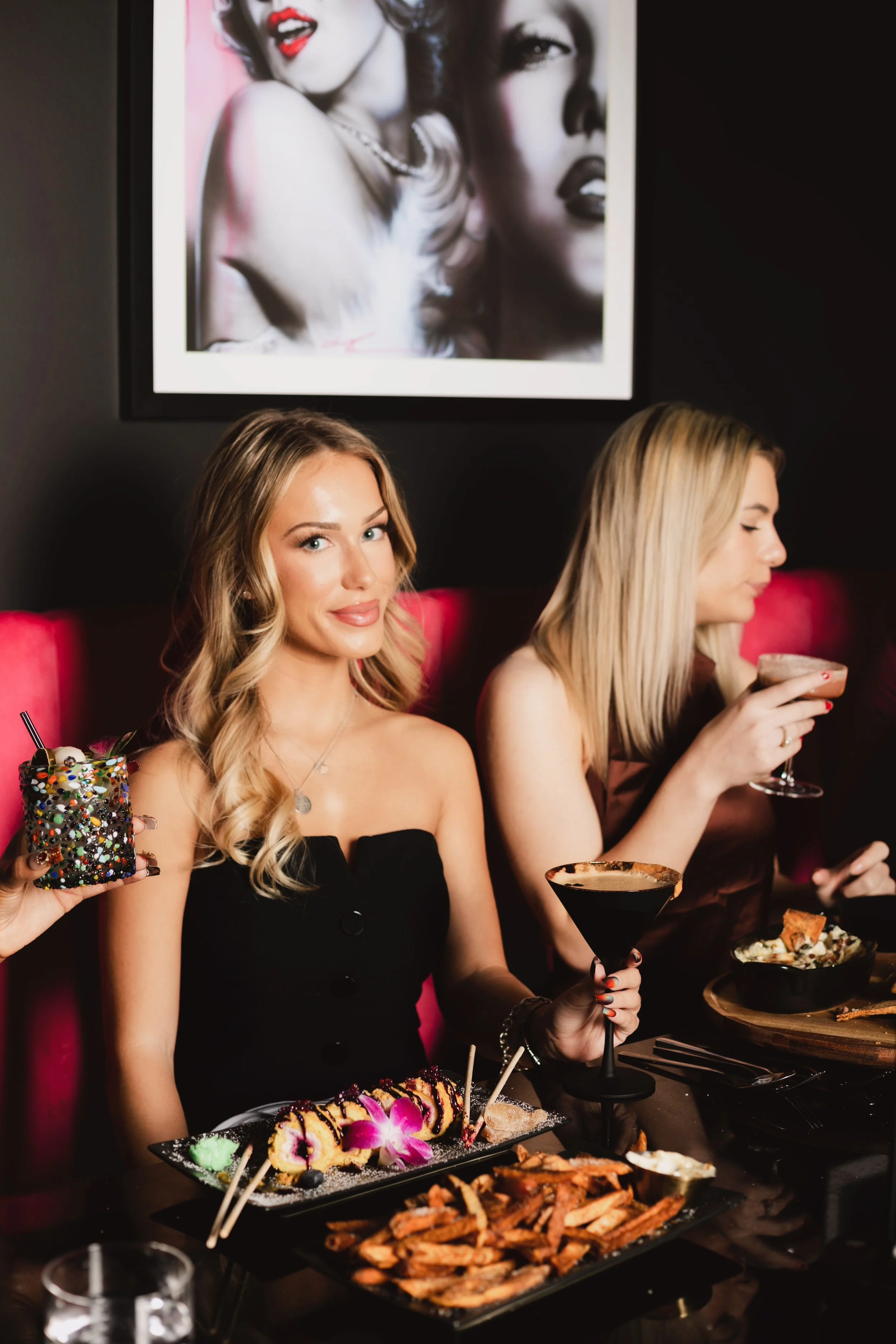 Guests enjoying cocktails and food at Silk Utica