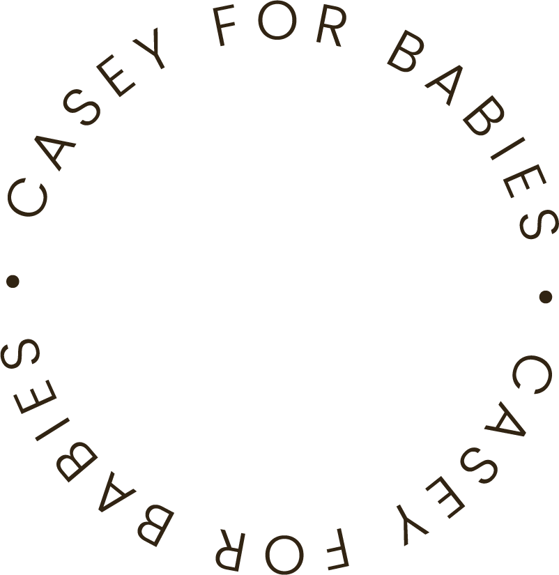 Circular logo with the text 'Cаси for Babies' written around the top half and 'Baby & Kids' around the bottom half.