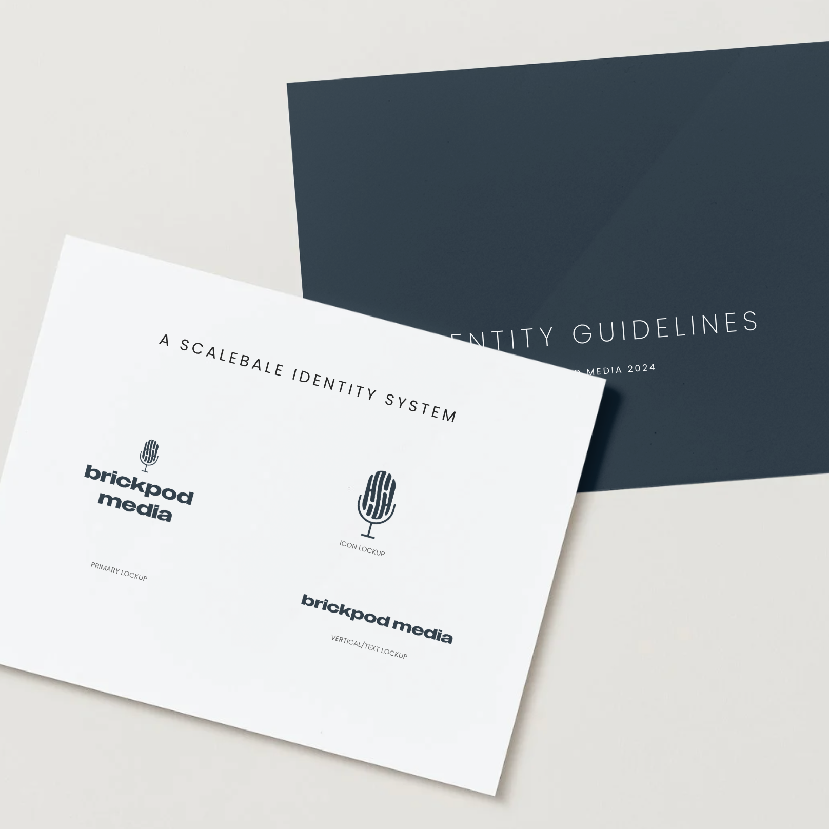 Brand identity guidelines booklet and a scalable identity system sheet for Brickpad Media, featuring logo lockup options on a grey and white background.