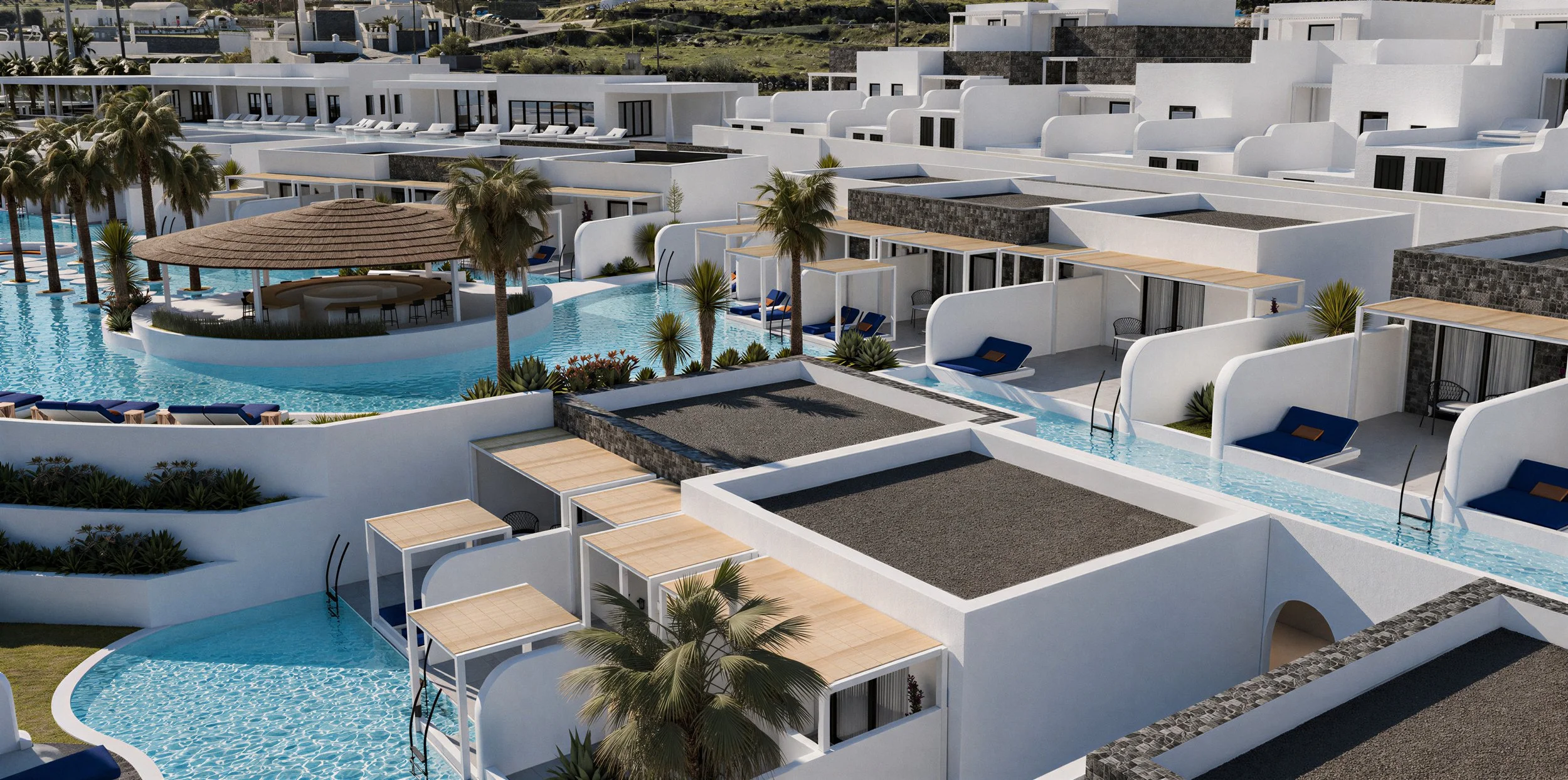 Aerial view of a luxurious hotel resort with multiple white buildings, pools, palm trees, and sun loungers in a coastal setting.