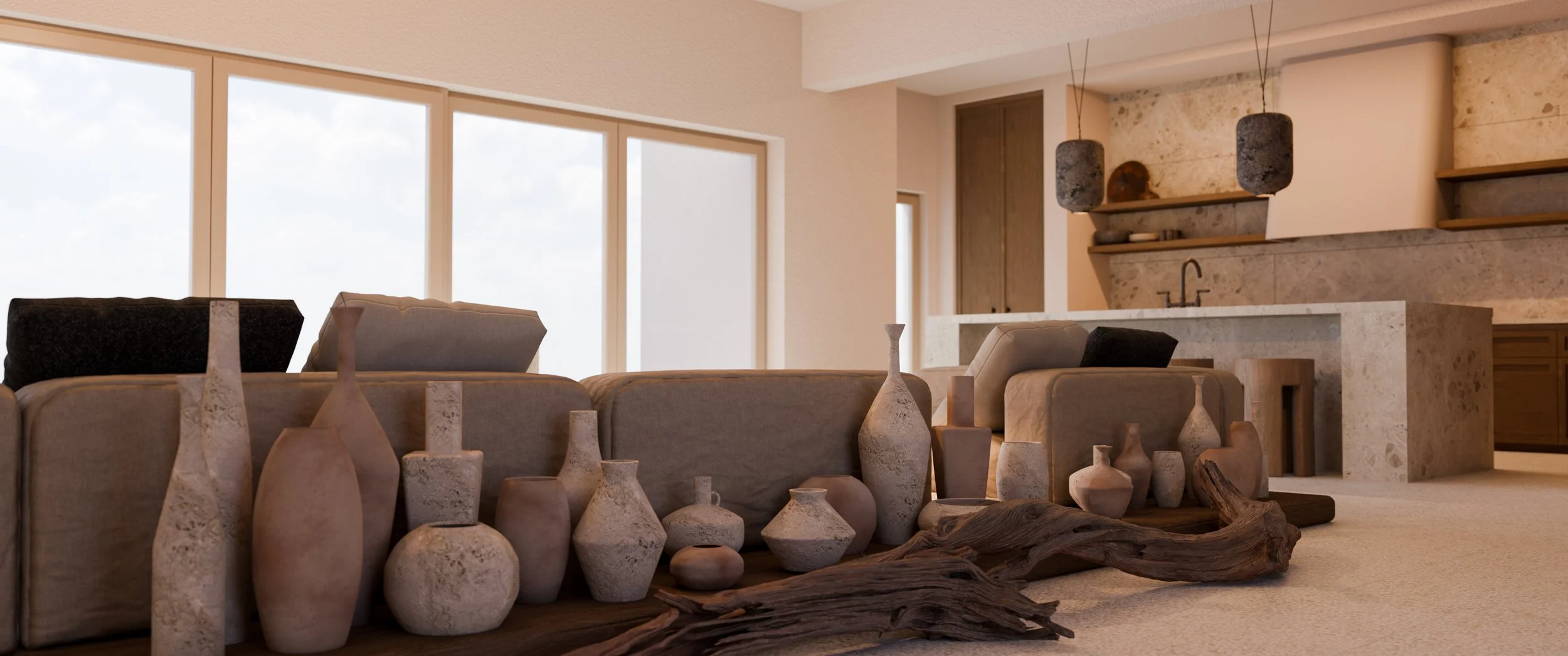 Living room with neutral-colored sofas, decorative vases, and a stone kitchen area with pendant lights and open shelves, large windows letting in natural light.