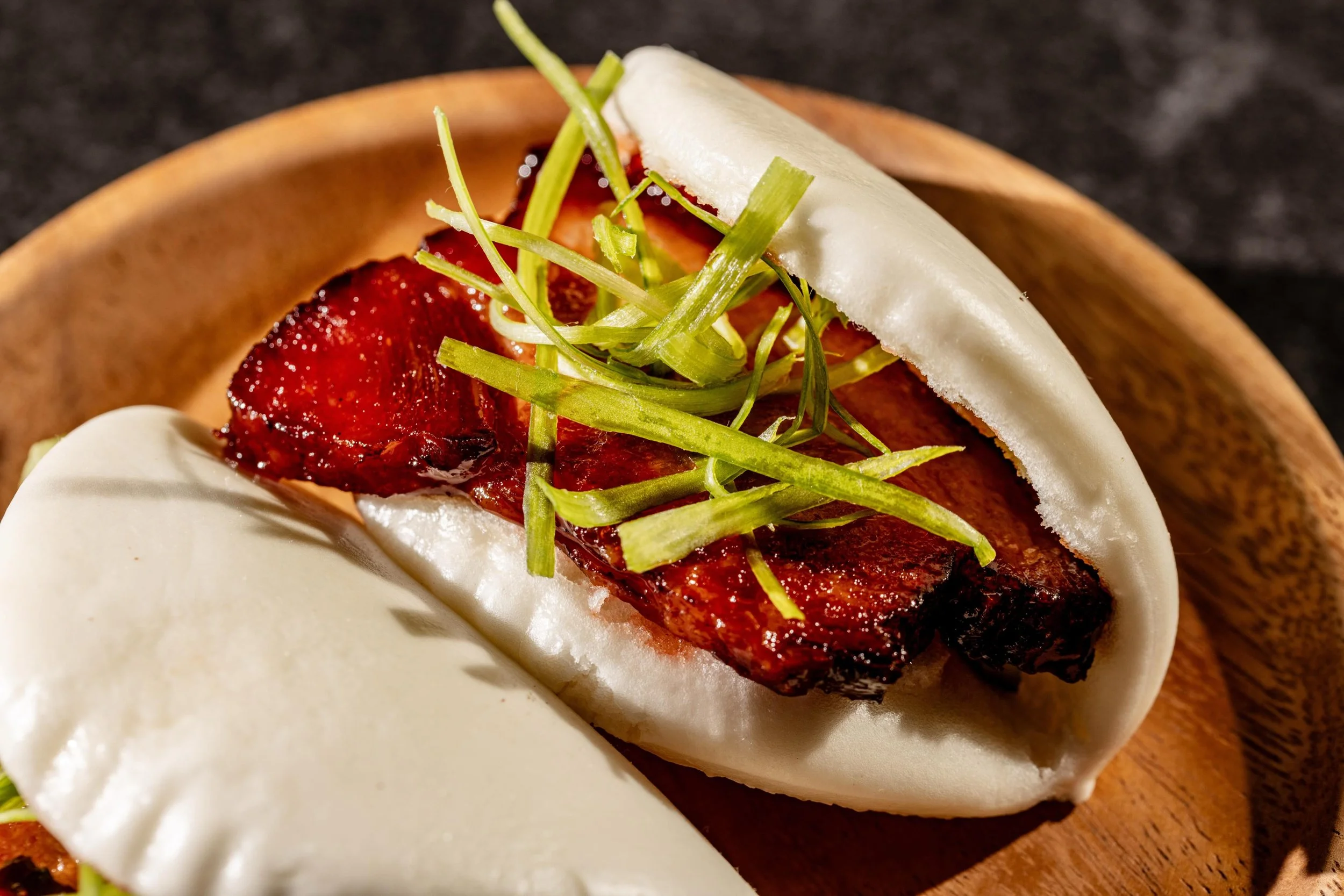 @nightroosterdallas Delicious Lu Rou Bao Buns for yiur appetizer,or available on our Happy Hour menu! Slow braised pork belly inside house-made Bao Buns.