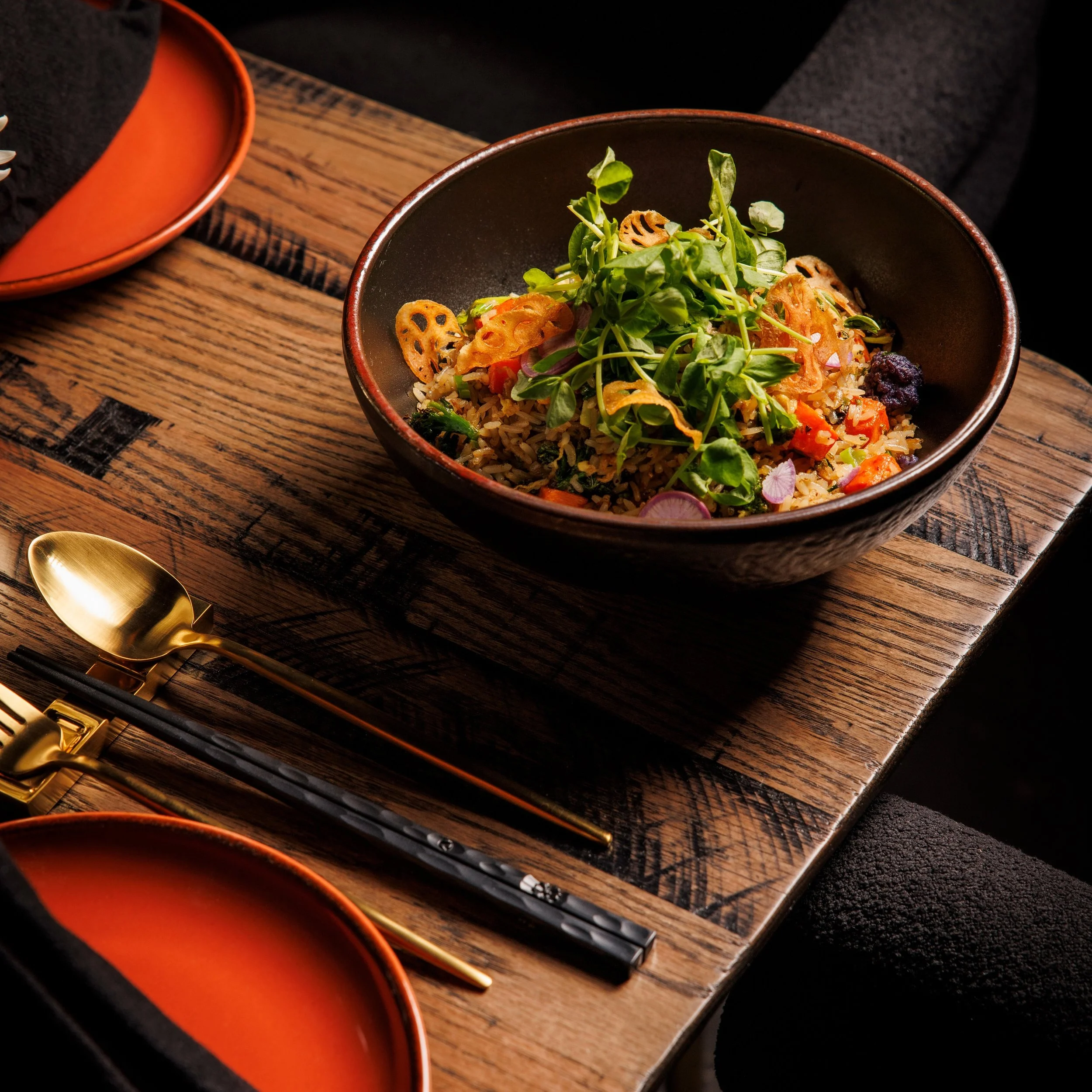 A vibrant bowl of Vegetable Fired Rice, crisp lotus root chips, and fresh greens&mdash;elevated with the bold, Texas-inspired flavors that define Night Rooster by 
Chef Shirley Chung.

Reserve your table at the link in bio.