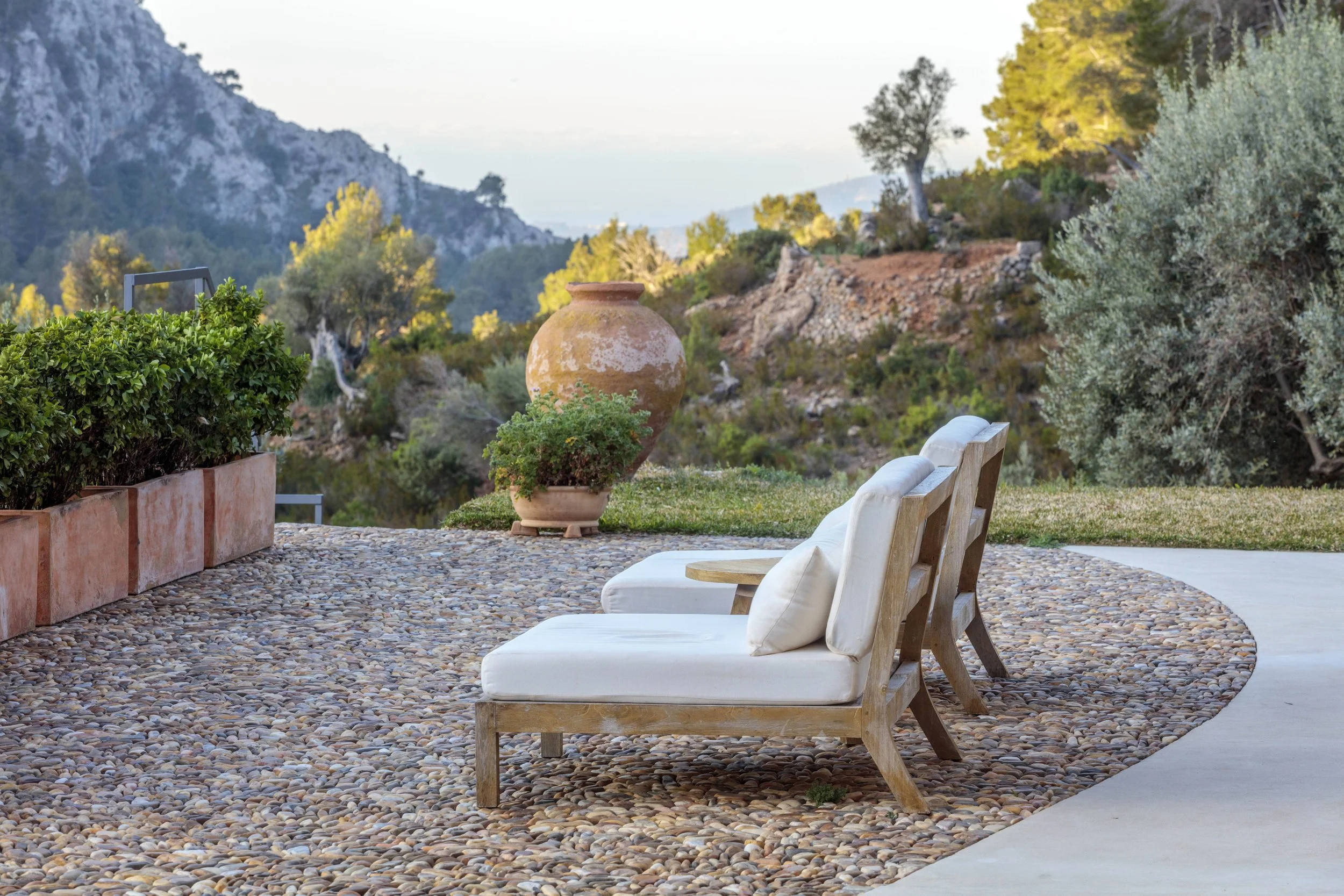 Rustic stone terrace design with planting, Mallorca garden project